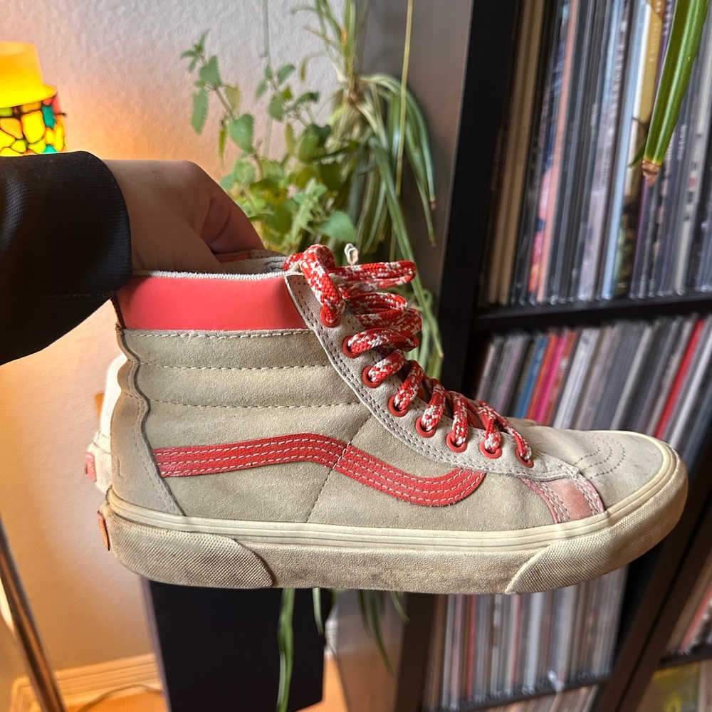 High-Top Vans Sneakers with Orange Accents